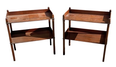 Lot 47 - A pair of reproduction mahogany two tiered...