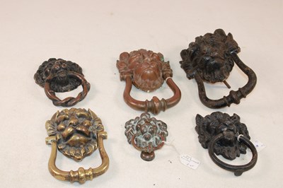 Lot 1122 - Six late 19th/early 20th century lion mask...