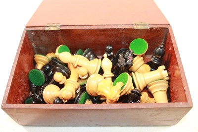 Lot 1009 - STAUNTON; a chess set with stamped red...