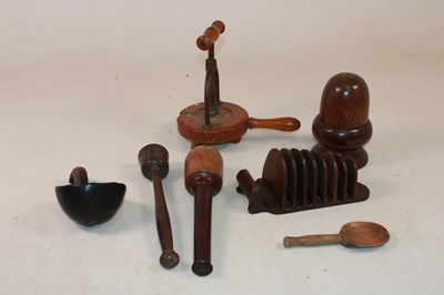 Lot 1056 - A small group of treen, including a lignum...
