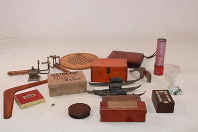 Lot 1059 - A group of items related to toys and games,...