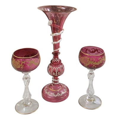 Lot 540 - A late 19th century cranberry glass snake vase,...