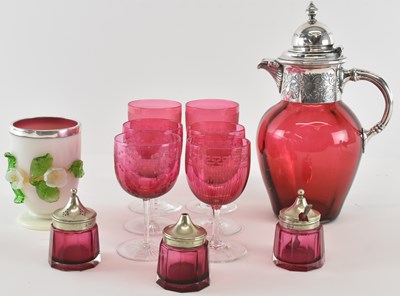 Lot 541 - A Victorian cranberry glass claret jug with...
