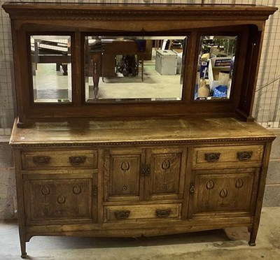 Lot 520 - An oak Art Nouveau mirror backed side board,...