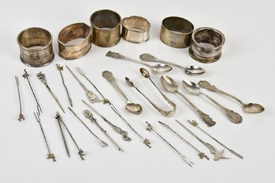 Lot 1505 - Four hallmarked silver napkin rings, a set of...