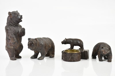 Lot 1350 - BLACK FOREST; four carved models of bears,...