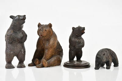 Lot 1351 - BLACK FOREST; four carved models of bears...