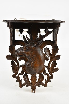 Lot 1300 - BLACK FOREST; a carved wall bracket...