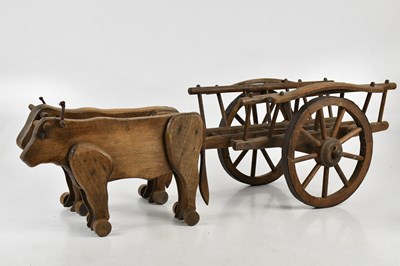 Lot 1270 - A decorative treen hay cart pulled by two...