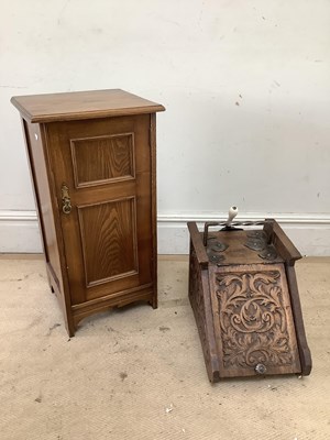 Lot 2133 - A Victorian carved oak coal scuttle and an oak...