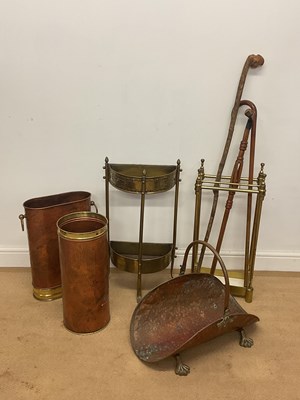 Lot 135 - Four various brass and copper umbrella stands...