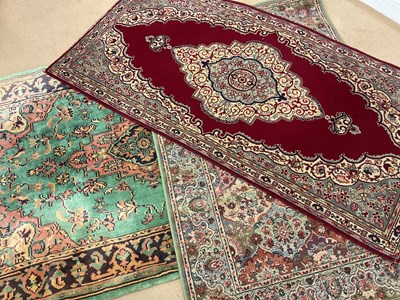 Lot 502 - A Persian Kirman rug and two other Persian...