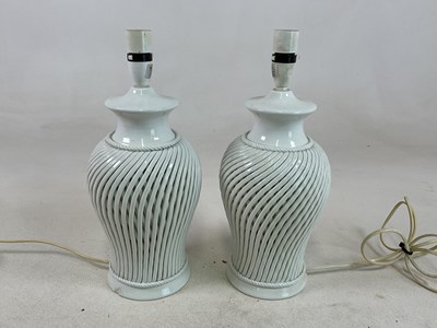 Lot 493 - A pair of Italian white lattice ceramic table...