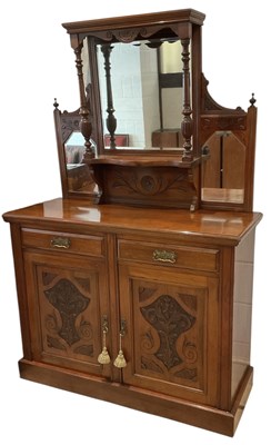 Lot 28 - An early 20th century carved mahogany mirror...