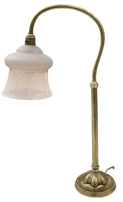 Lot 103 - An early 20th century brass desktop reading...