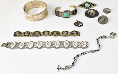 Lot 1123 - A collection of silver and white metal...