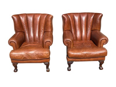 Lot 2193 - A pair of good quality brown leather wingback...