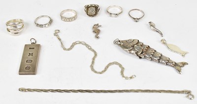 Lot 1120 - A group of silver jewellery, to include an...
