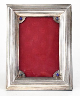 Lot 664 - CARTIER; a white metal photograph frame set...