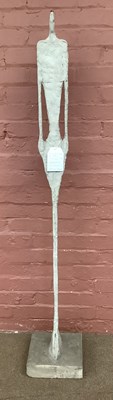 Lot 1407 - IN THE STYLE OF ALBERTO GIACOMETTI; a concrete...