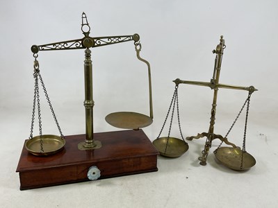 Lot 1097 - A set of Victorian brass beam scales with...