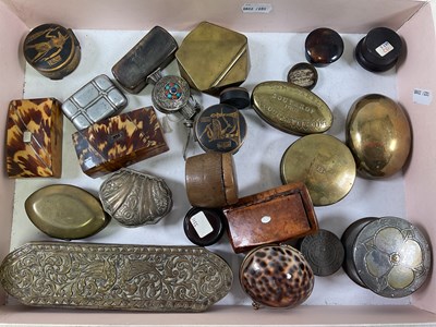 Lot 1063 - A group of snuff boxes including an oval brass...