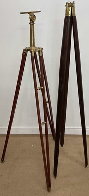 Lot 1109 - A large brass mounted teak tripod for a...