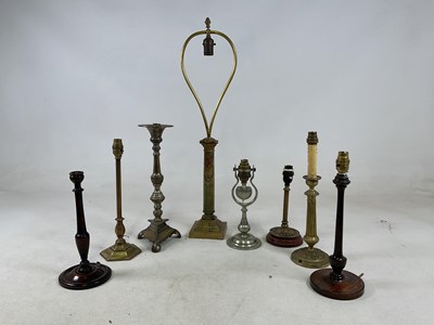 Lot 1216 - An early 20th century nickel plated lamp with...