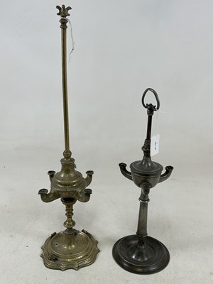 Lot 1217 - A late 18th century pewter whale oil lamp with...