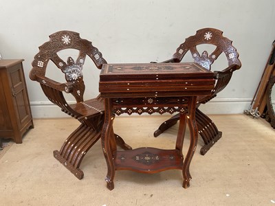 Lot 2194 - A reproduction Moorish fold-over swivel top...