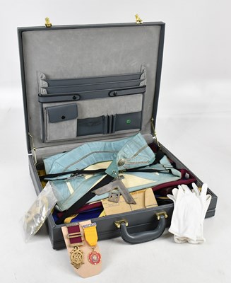 Lot 1261 - MASONIC INTEREST; a suitcase containing a...