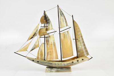 Lot 1311 - A cow horn model of a sailing vessel, height...