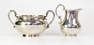 Lot 879 - GARRARDS; a Victorian hallmarked silver milk...