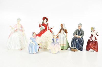 Lot 165 - ROYAL DOULTON; a collection of six figures,...