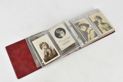 Lot 443 - A postcard album containing late 19th century...
