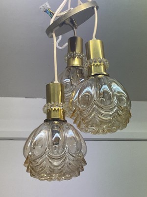 Lot 495 - A mid 20th century three tier drop pendant...