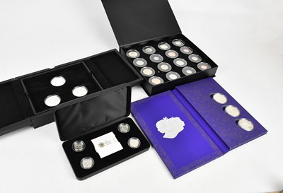 Lot 2512 - A collection of commemorative coin sets,...