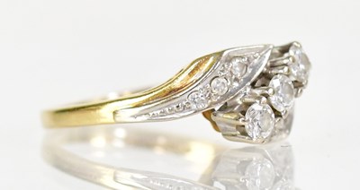 Lot 1020 - An 18ct yellow gold ring set with a diagonal...