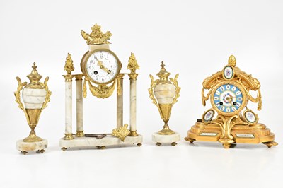 Lot 2382 - A French gilt mantel clock, with blue enamel...