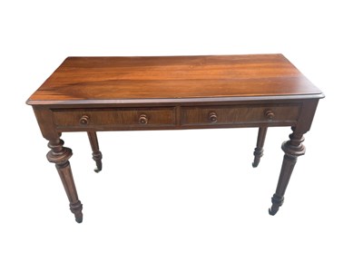 Lot 2136 - A 19th century mahogany two drawer hall table.