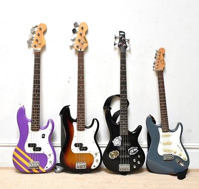 Lot 1104 - A collection of three bass guitars comprising...