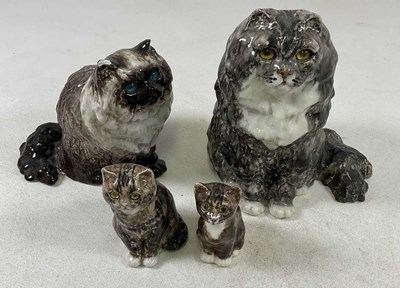 Lot 162 - WINSTANLEY; four pottery cats, including a...
