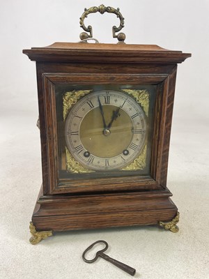 Lot 478 - A late 19th century oak cased bracket clock,...
