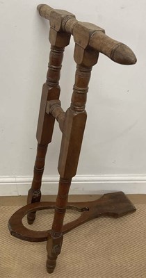Lot 64 - A Victorian walnut and oak folding boot jack,...