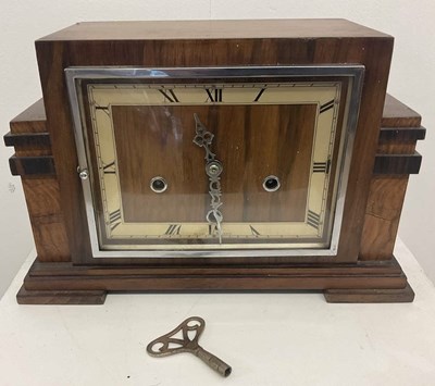 Lot 662 - An Art Deco walnut mantel clock, with Roman...