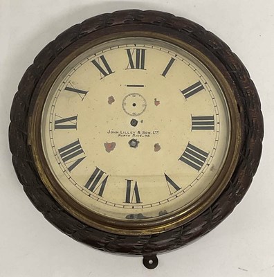 Lot 665 - An early 20th century oak cased ship's wall...