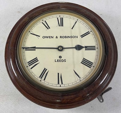 Lot 457 - A late 19th century oak cased circular wall...