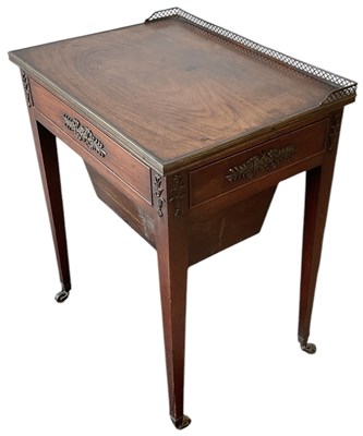 Lot 14 - A late 19th century French mahogany brass...