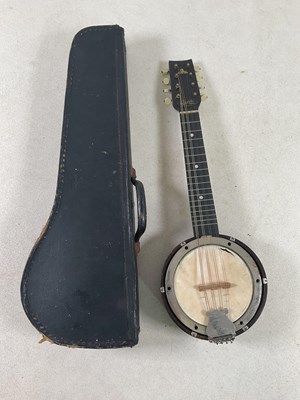 Lot 55 - A cased banjolele, bearing label inscribed...