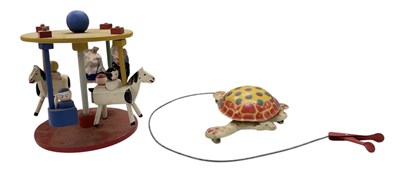 Lot 464 - A 1950s tinplated Mobo 'Toy-Toise' and a...